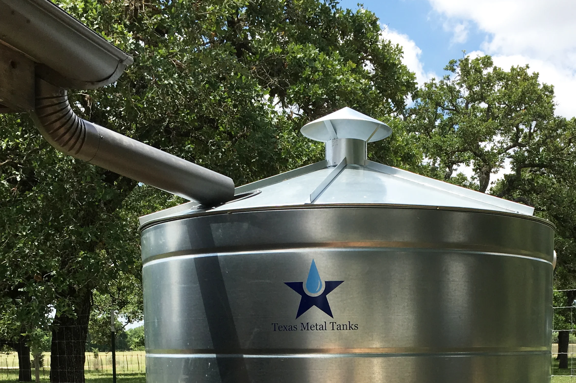 Texas Metal Tanks galvanized steel rainwater harvesting tank installed above ground